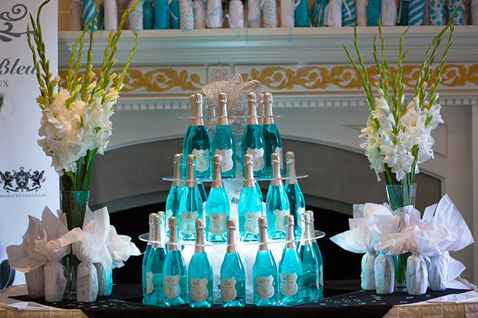 Blanc de Bleu California lgbt wedding wine bottles tier stacked