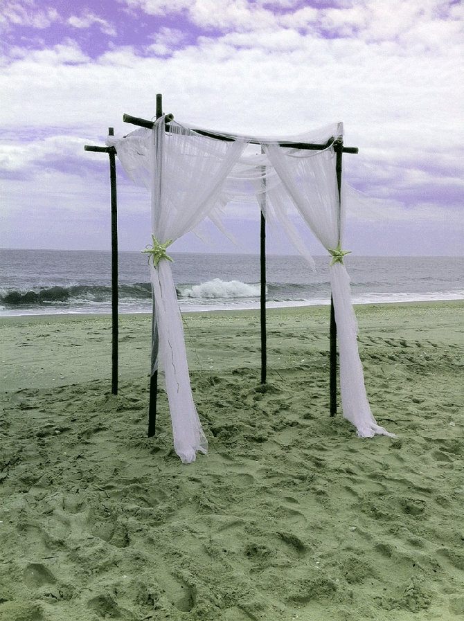 Crystal Mary Us - Wedding alter on the sand and waves