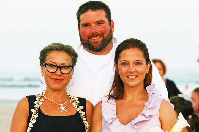 Crystal Mary Us - Couple with wedding officiant