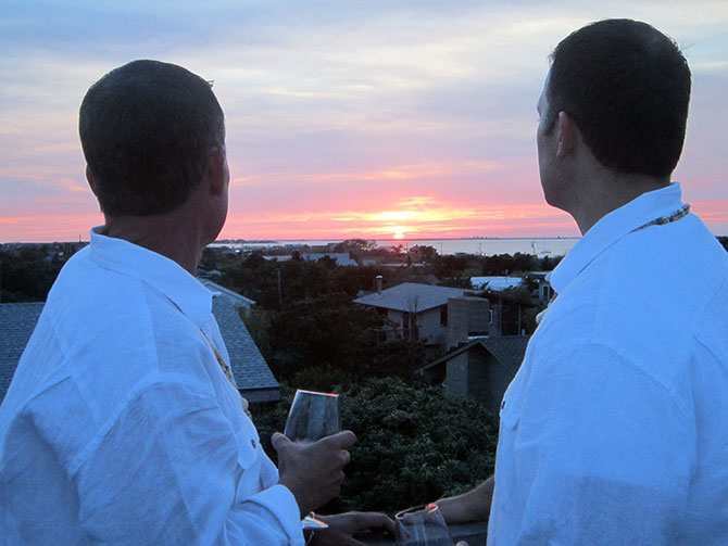 Lasting Footprints Reverend Sarah Margaret - Gay married couple at sunset