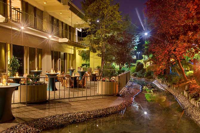 DoubleTree by Hilton Sacramento Outdoor seating by Stream