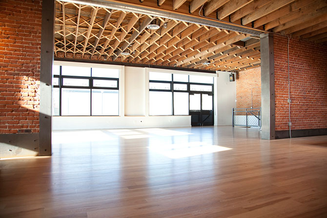 Colorado Wood floors, brick walls and exposed ceiling - Wash Park Studio