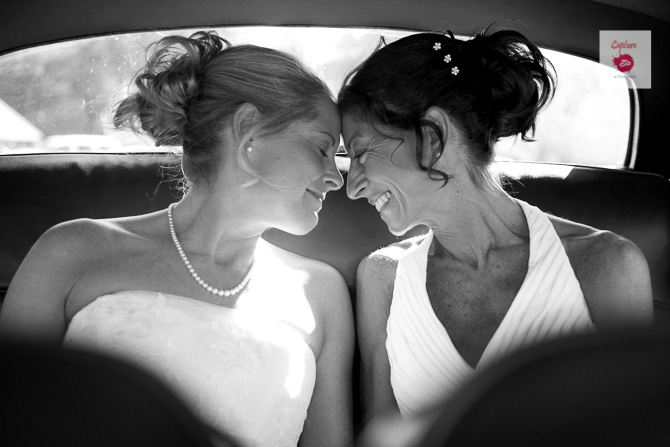 Capture Photography - Black and white candid photograph of brides