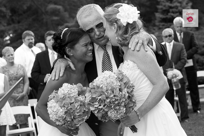 Capture Photography - Black and white photograph of brides and family