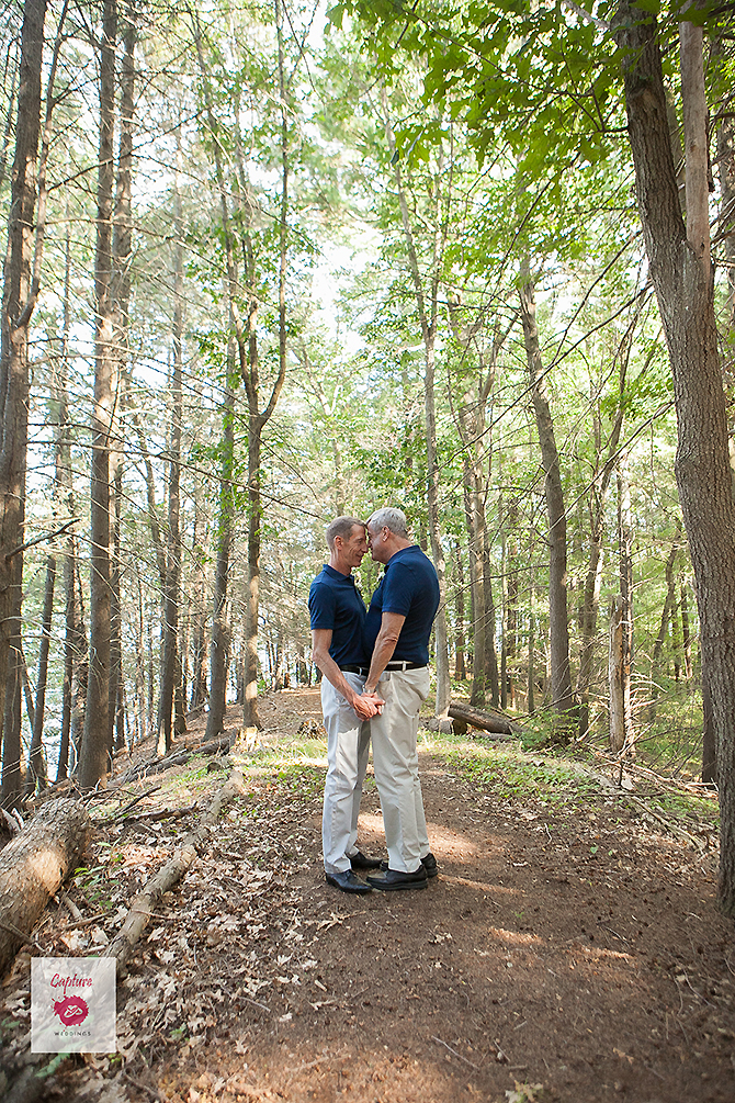 Capture Photography - grooms together in the woods