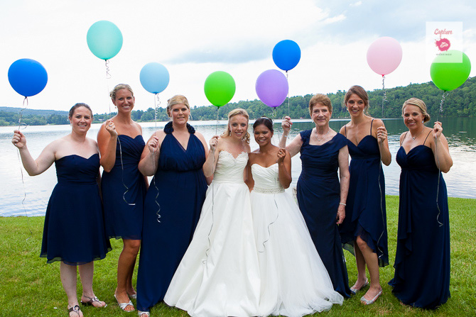 Capture Photography - Married brides with wedding party holding balloons