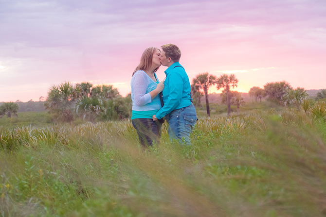 A. Harris Photography - LGBT couple kissing in a field