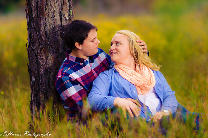 A. Harris Photography - Photo of brides sitting under a tree