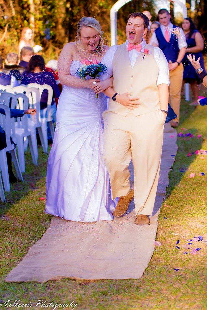 A. Harris Photography - Brides walking down the aisle
