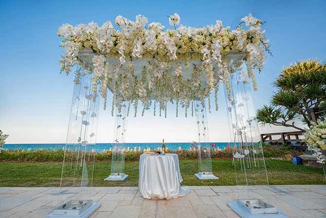 Orchid beach wedding ceremony - South Florida LGBT Wedding Floral Design and Decor - Dalsimer Atlas
