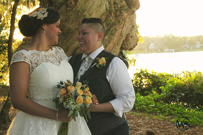 I DO Weddings By Sheri - Lesbian Couple Posing Outdoors