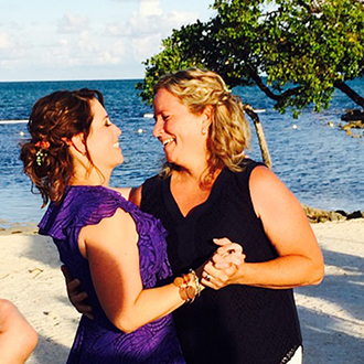 lesbian wedding first dance - Ocean Pointe Suites