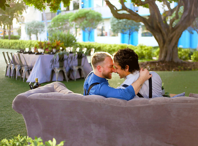 Outdoor tropical LGBT wedding reception at Postcard Inn On The Beach St. Pete Beach