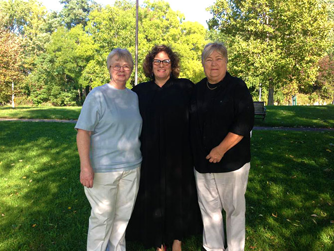 Rainbow Bells - Lesbian couple and officiant