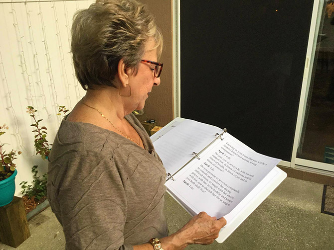 Deborah Hansen reviewing wedding ceremony - Weddings and More by Deb