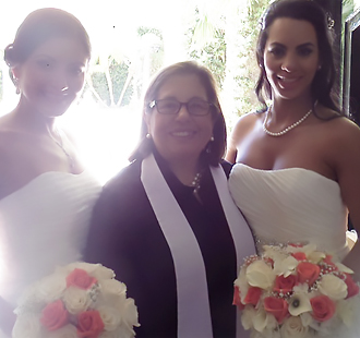 Weddings by Cecilia West Palm Beach, Florida Bilingual Same-Sex Wedding Officints Cecilia posing with brides