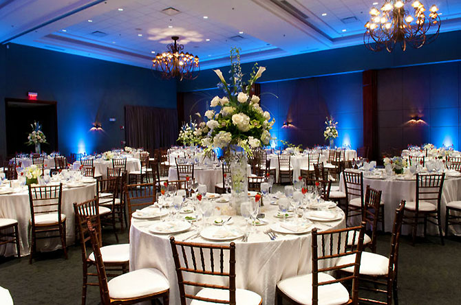 The Stonegate Conference and Banquet Centre - Reception dining table with large floral centerpiece
