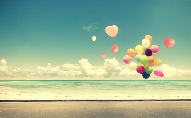 Beach Balloon release - Presto Magic Travel - Cruise Travel Agent - LGBT Wedding Cruises and Honeymoons