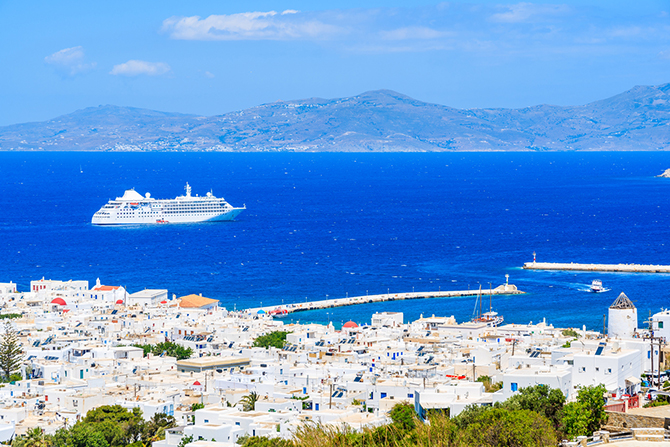Cruise ship uliing into port - Presto Magic Travel - Cruise Travel Agent - LGBT Wedding Cruises and Honeymoons