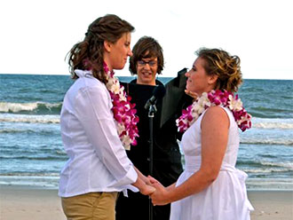 For This Joyous Occasion - Lesbian brides and beachside wedding ceremony