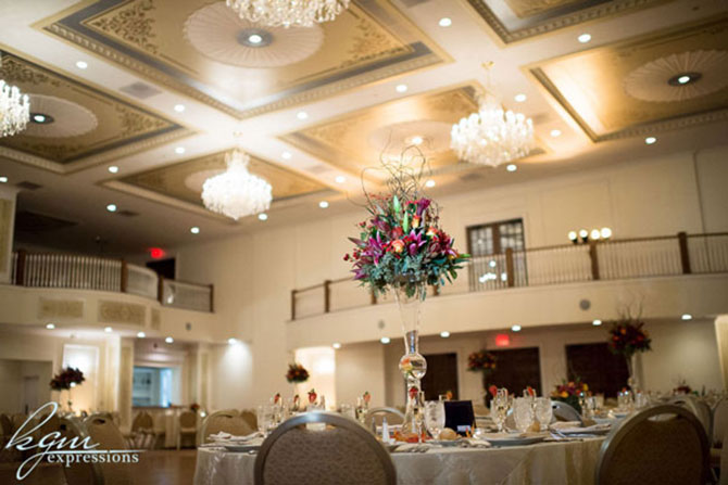 Pocket Full of Posies Florist - Creative floral arrangement centerpiece