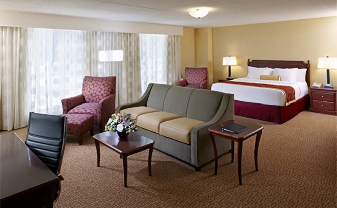 The Clinton Inn Hotel & Event Center - King size guestroom