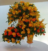EM - Event Management - Orange and red floral arrangements