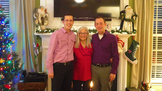 Creative Celebrations - Gay Grooms and Officiant at Christmas