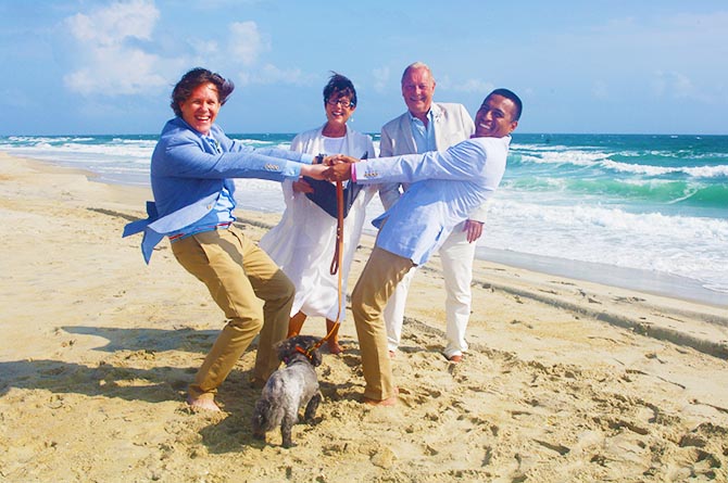 Rev. Tanya Young Outer Banks Weddings - Gay couple on the beach