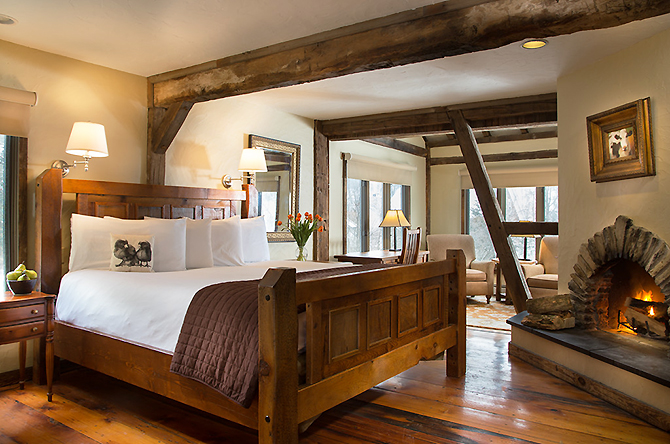 beautiful king bed with solid wood headboard at Glasbern Fogelsville, PA
