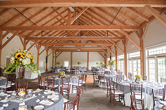 Bright reception venue in white with yellow sunflowers Glasbern Fogelsville, PA