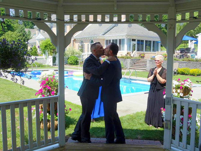 Reverend Pamela Brehm - Just married grooms kiss