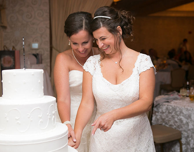 Springfiled Country Club Cutting Cake LGBT wedding