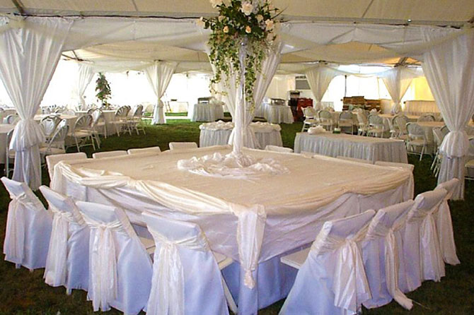 United Party Rental Center - Elegant table setting with large centerpiece