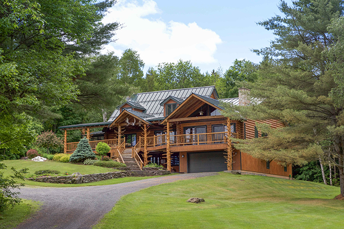 Front Exterior of Log Cabin in Central Vermont LGBT Owned Bed and Breakfast - Moose Meadow Lodge