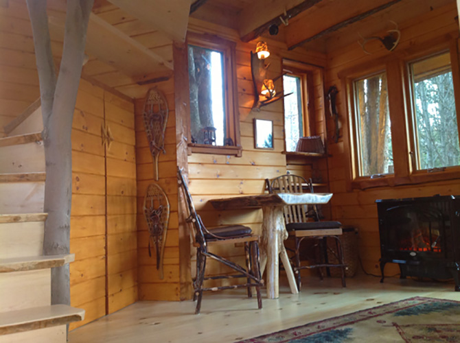 Moose Meadow Lodge -Tree House Interior - Wood stove