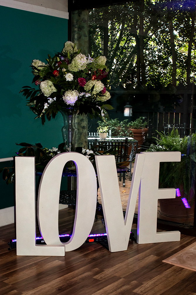 Butler's Unique Catering & Events - Large LOVE and floral centerpiece