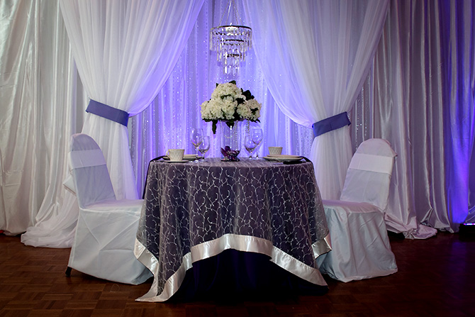 Butler's Unique Catering & Events - Crystal Chandelier and table for two