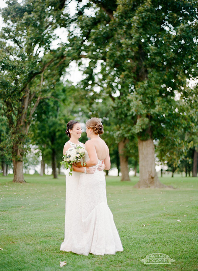 Lesbian wedding day embrace - Lake Lawn Resort in Wisconsin