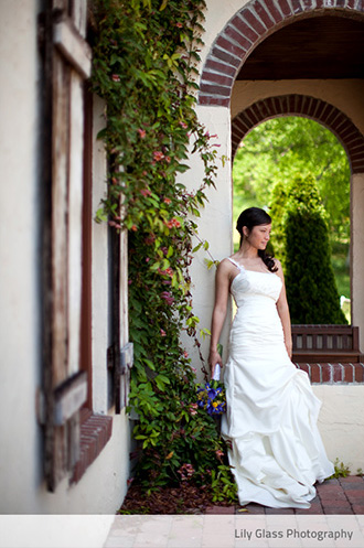 Crown Winery LLC - Bride in arch and foliage