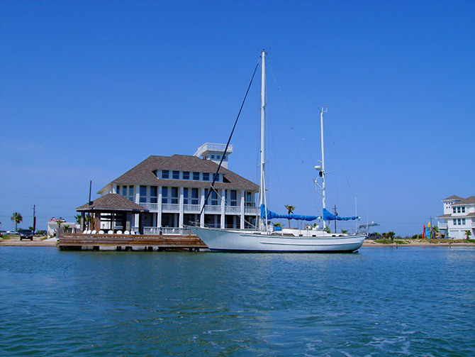 Mansion By The Sea - sail boat docked