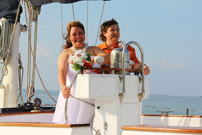 Mansion By The Sea - LGBT wedding couple on boat