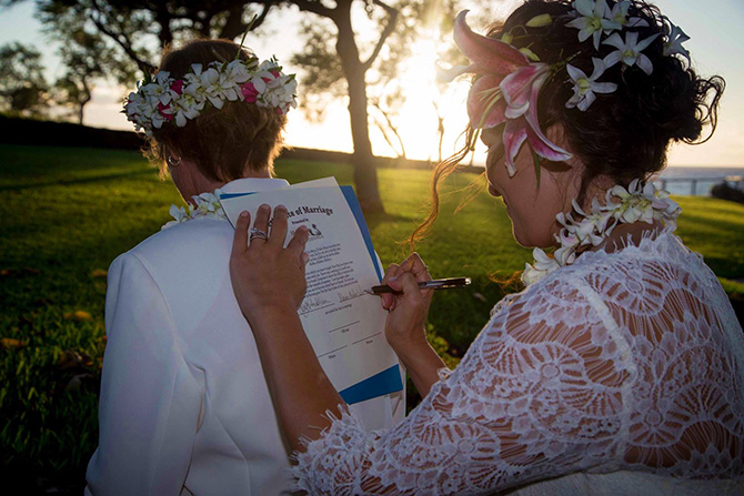 Maui Aloha Weddings Kihei Hawaii - Lesbian Couple Signs The Marriage Certificate
