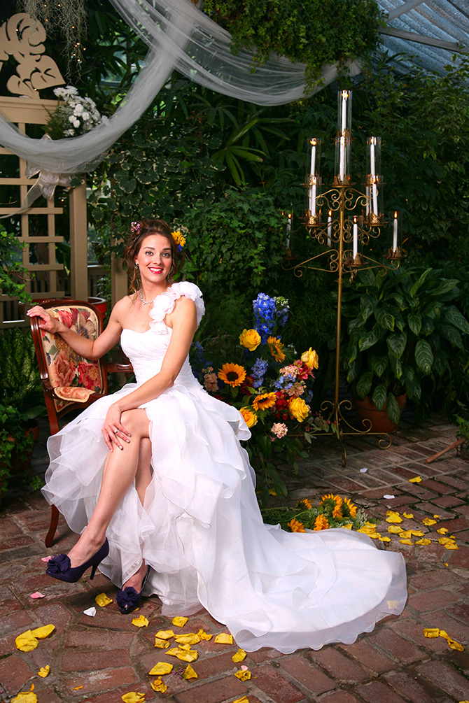 Memories Are Forever - Portrait of seated bride in fairytale garden with candleabra
