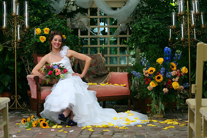 Memories Are Forever - Portrait of bride on sofa in lush gardens