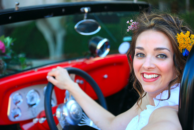 Memories Are Forever - Close up photo of bride arriving in convertible