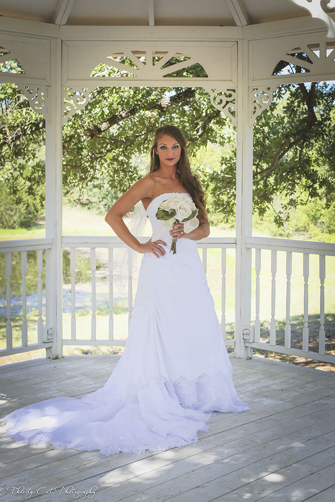 Towering Oaks Ranch Resort - bride under gazebo