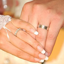 Trinity Hawaiian Weddings - Candid shot of couple's hands and wedding rings