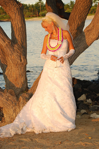 Trinity Hawaiian Weddings - Bride Posing Near A Tree On The Beach