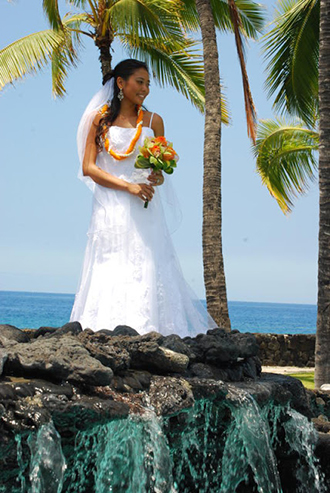Trinity Hawaiian Weddings - Bride Posing Near A Water Fall